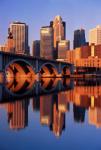 Snapshot metropolis reflected in the water