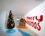 New Year theme with christmas tree and child's house