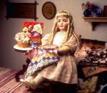 Doll at fancy-work