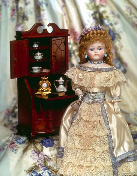 Doll and tea-set in the sideboard