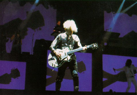 Martin Gore performing solo on guitar
