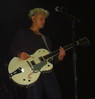Martin Gore performing on guitar